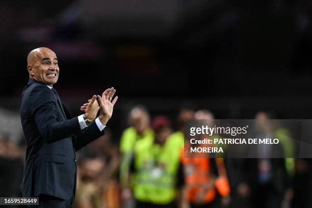 Portugal's Spanish coach Roberto Martinez gestures during the EURO 2024 first round group J qualifying football match between Portugal and Luxembourg...