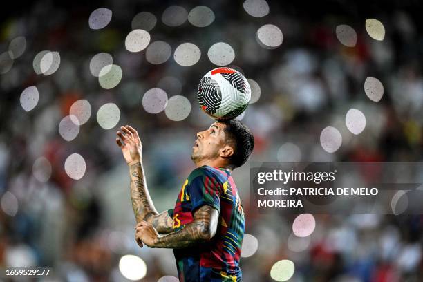 Portugal's defender Joao Cancelo controls the ball during the EURO 2024 first round group J qualifying football match between Portugal and Luxembourg...