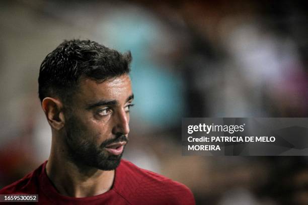 Portugal's midfielder Bruno Fernandes looks on during the EURO 2024 first round group J qualifying football match between Portugal and Luxembourg at...