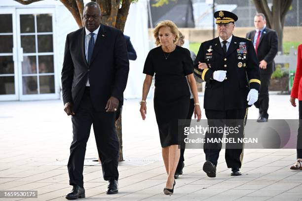 First Lady Jill Biden , US Defense Secretary Lloyd Austin and Chairman of the Joint Chiefs of Staff, Army General Mark Milley , arrive to participate...