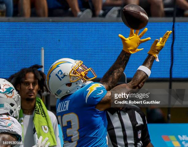 Inglewood, CA, Sunday, Sept. 10, 2023 - Los Angeles Chargers wide receiver Keenan Allen hauls in a long pass against the Miami Dolphins at SoFi...