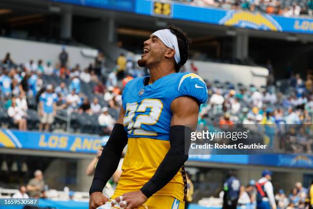 Inglewood, CA, Sunday, Sept. 10, 2023 - Los Angeles Chargers safety Alohi Gilman yells to fans before a game against the Miami Dolphins at SoFi...