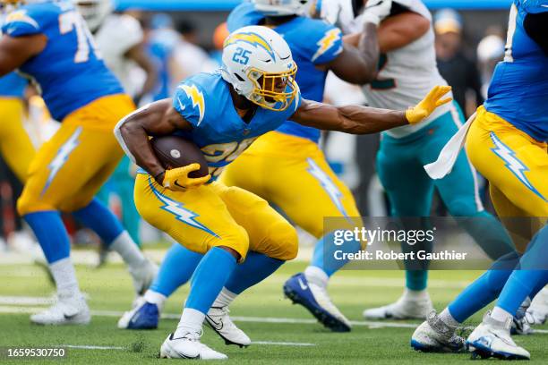 Inglewood, CA, Sunday, Sept. 10, 2023 -Los Angeles Chargers running back Joshua Kelley rushes against the Miami Dolphins at SoFi Stadium.