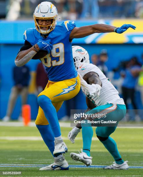 Inglewood, CA, Sunday, Sept. 10, 2023 - Los Angeles Chargers tight end Donald Parham Jr. Turns upfield on a reception against the Miami Dolphins at...