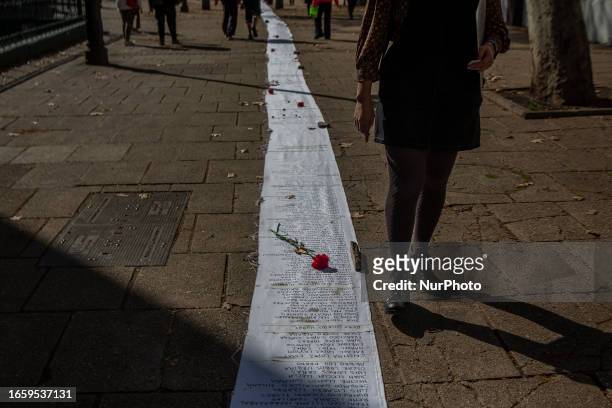 Long list with the names of those executed during the civic-military dictatorship of Augusto Pinochet , leads to the front of a building located at...
