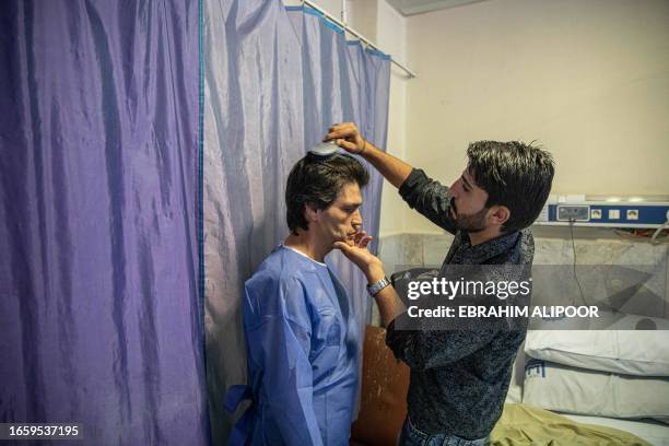 Marivan, Iran. Ahmad, 41 years old from Mariwan, lost both of his hands to frostbite when he became lost in the mountains along the Iran-Iraq border...