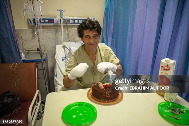 Marivan, Iran. Ahmad, 41 years old from Mariwan, lost both of his hands to frostbite when he became lost in the mountains along the Iran-Iraq border...