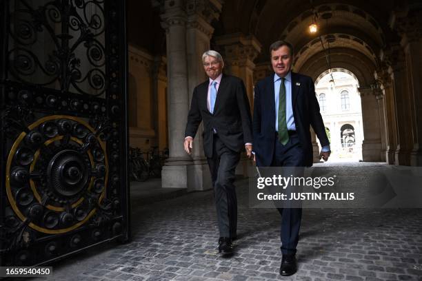 Britain's Minister of State for Development in the Foreign, Commonwealth and Development Office Andrew Mitchell and Britain's Minister without...