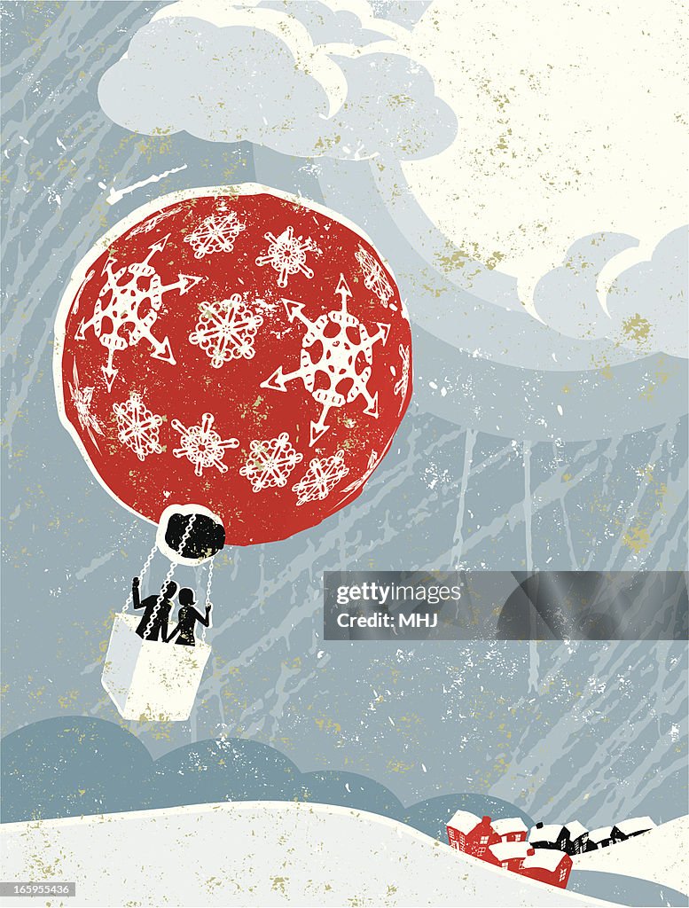 Man and Woman in Christmas Bauble Shaped Hot Air Balloon