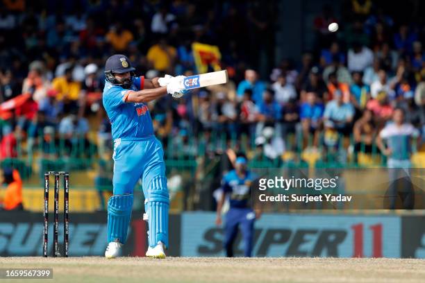 Rohit Sharma captain of India hits a six during the Asia Cup Super Four match between Sri Lanka and India at R. Premadasa Stadium on September 12,...