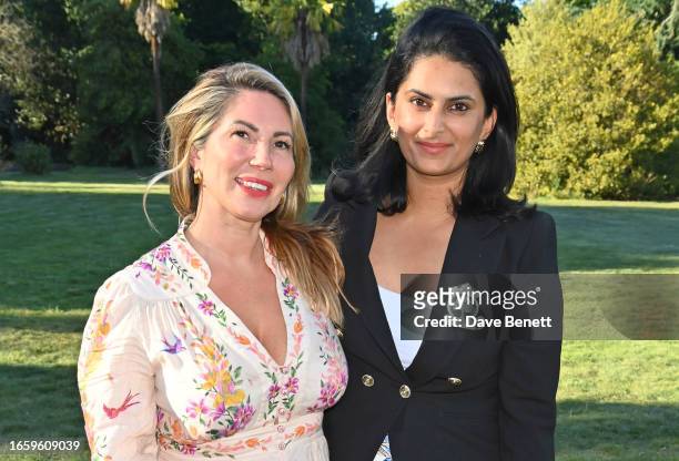 Chloe Franses and Smruti Sriram, CEO of Bags of Ethics attend an event hosted by Green Tree Badge by Bags of Ethics and Royal Forestry Society at Kew...