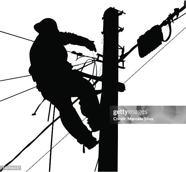 electrician silhouette working in a pole - blackout stock illustrations