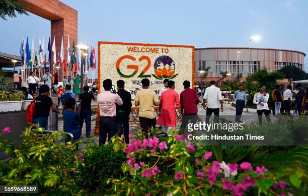 People gathered near Bharat Mandapam at Pragati Maidan after the G20 Summit on September 11, 2023 in New Delhi, India.