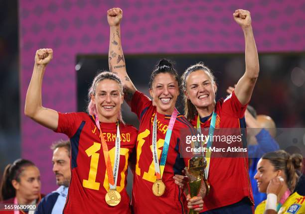 Alexia Putellas, Jennifer Hermoso and Irene Paredes of Spain celebrate with the trophy during the FIFA Women's World Cup Australia & New Zealand 2023...