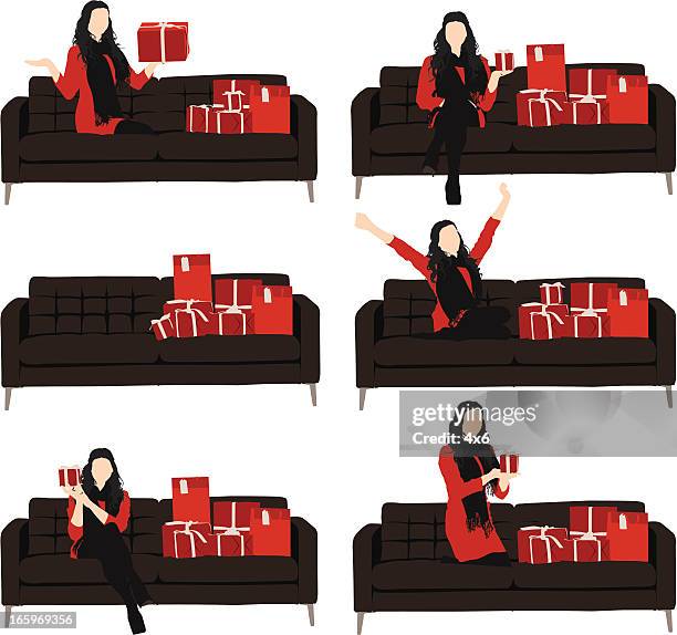female sitting on couch with gift boxes - nice couch isolated stock illustrations