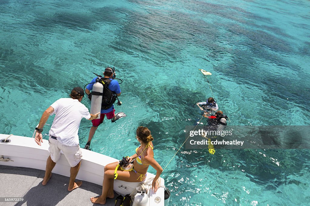 Divers getting ready for a diving excursion in the Caribbean