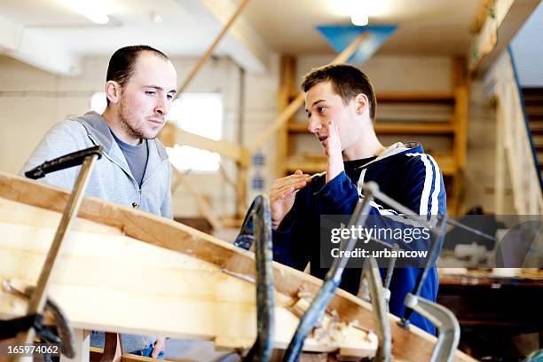 planning a boat build - scheepsbouwer stockfoto's en -beelden