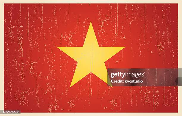 vietnamese flag in grunge and vintage style. - vietnamese flag stock illustrations