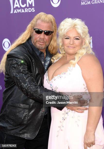 Personalities Dog the Bounty Hunter and Beth Chapman arrive at the 48th Annual Academy of Country Music Awards at the MGM Grand Garden Arena on April...