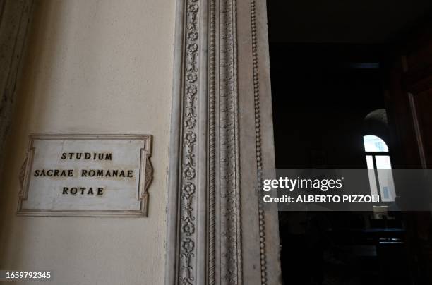 This picture taken on September 12, 2023 in Rome shows the entrance of the tribunal of the Roman Catholic Church, the Sacra Rota, at the Palazzo...