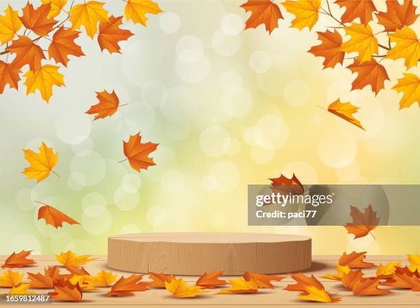 wooden podium with falling leaves. autumn background. - wooden table top down stock illustrations