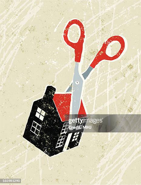 scissors cutting through a tiny house - tiny house stock illustrations