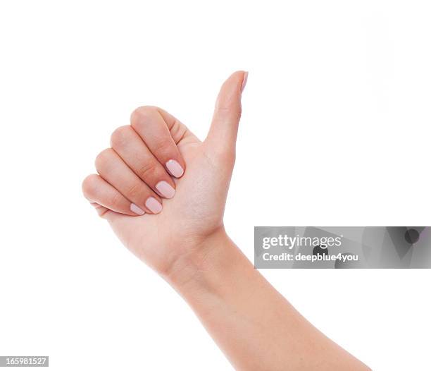 女性の手の親指を示すにホワイト - okサイン　女性 ストックフォトと画像