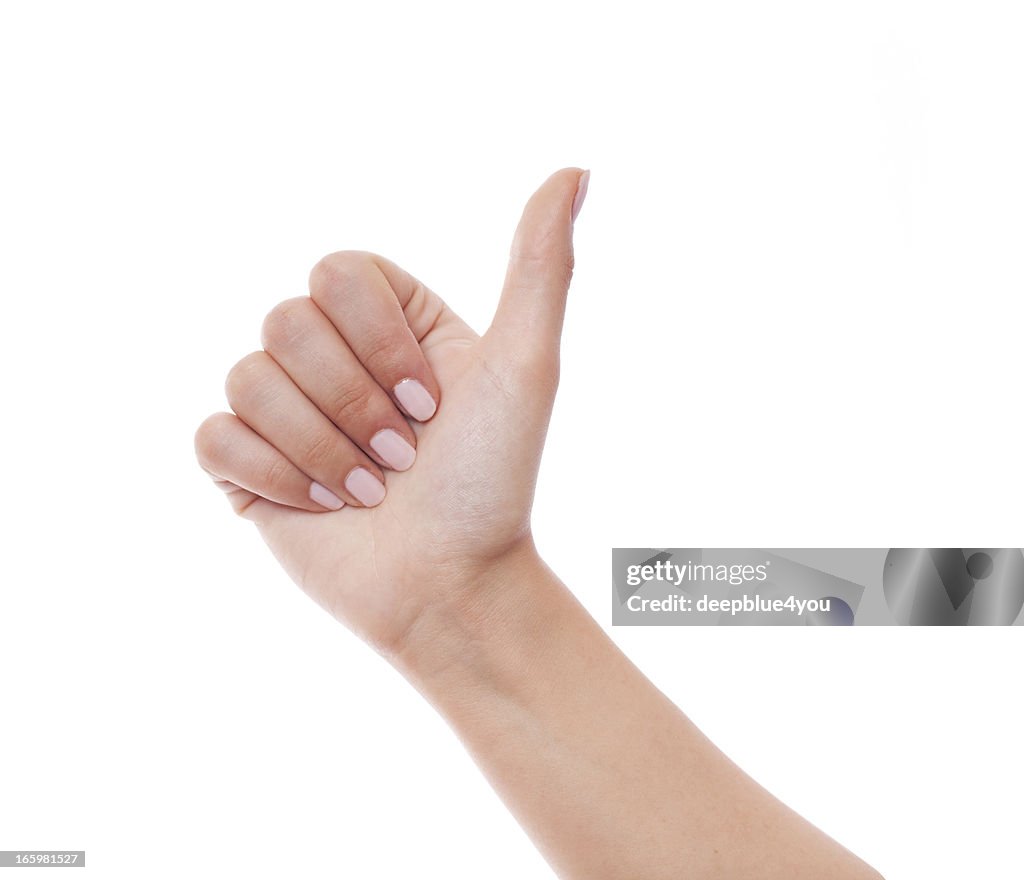 Woman hand showing Thumb up on white