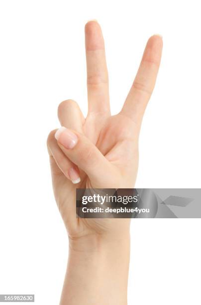 woman hand showing peace sign isolated on white background - finger bildbanksfoton och bilder