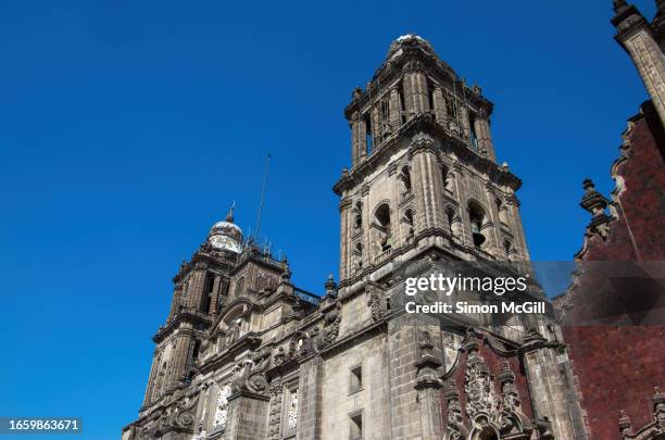 mexico city metropolitan cathedral [catedral metropolitana de la asunción de la santísima virgen maría a los cielos], centro histórico, mexico city, mexico - mexico city clock tower stock pictures, royalty-free photos & images