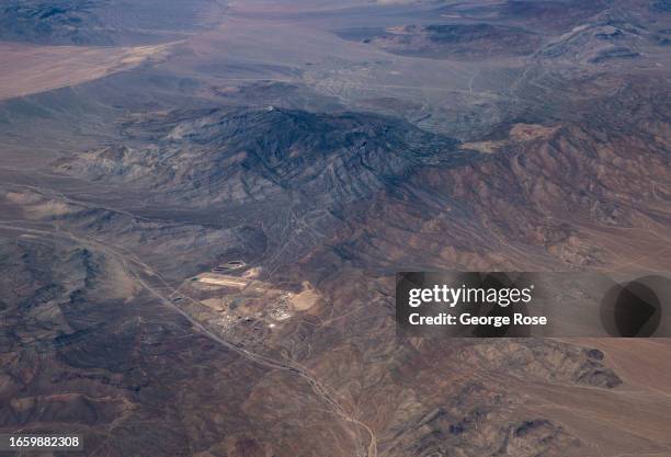 The Mountain Pass Rare Earth Mine & Processing Facility, owned by MP Materials, is viewed from a United Airlines Airbus A319 commercial flight flying...