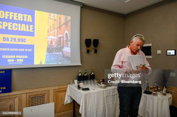 Michael O'Leary, chief executive officer of Ryanair Holdings Plc, draws on a graph during a news conference in Rome, Italy, on Tuesday, Sept. 12,...