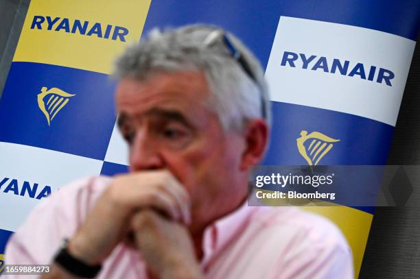 The Ryanair logo on a pull-up banner behind Michael O'Leary, chief executive officer of Ryanair Holdings Plc, during a news conference in Rome,...