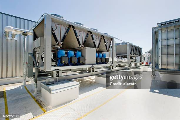 hvac installation with chillers and compressors - cooling tower stock pictures, royalty-free photos & images