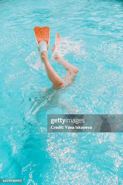 anticipated summer holidays: outdoor water sports and activities - competitive diving stock pictures, royalty-free photos & images