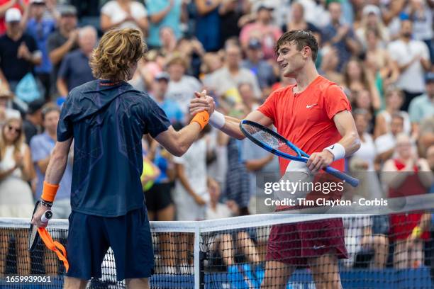 September 4: Winner Andrey Rublev of Russia is congratulated at the net by Jack Draper of Great Britain after their Men's Singles round four match on...