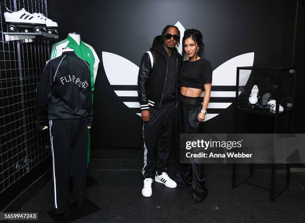 Nick Cannon and Bre Tiesi attend Flipper's Roller Boogie Palace x adidas celebration of fashion, hip-hop and the iconic Superstar, at Flipper's...