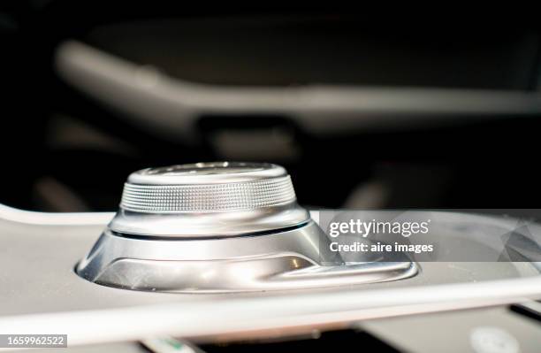 shifting gears of automatic transmission in a modern car. fragment of car control panel. - shift gear knob stock pictures, royalty-free photos & images
