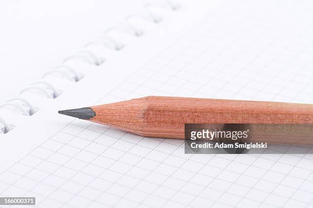notepad with pencil - pencil on white paper stock pictures, royalty-free photos & images
