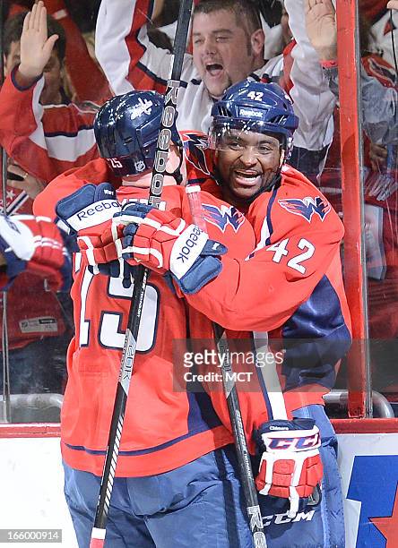 Washington Capitals right wing Joel Ward celebrates with Capitals left wing Jason Chimera , following his goal against the Tampa Bay Lightning in the...