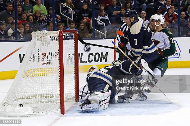 Jason Pominville of the Minnesota Wild beats Jack Johnson and Sergei Bobrovsky of the Columbus Blue Jackets for his first goal as a member of the...