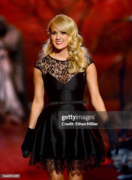 Singer Carrie Underwood performs onstage during the 48th Annual Academy of Country Music Awards at the MGM Grand Garden Arena on April 7, 2013 in Las...