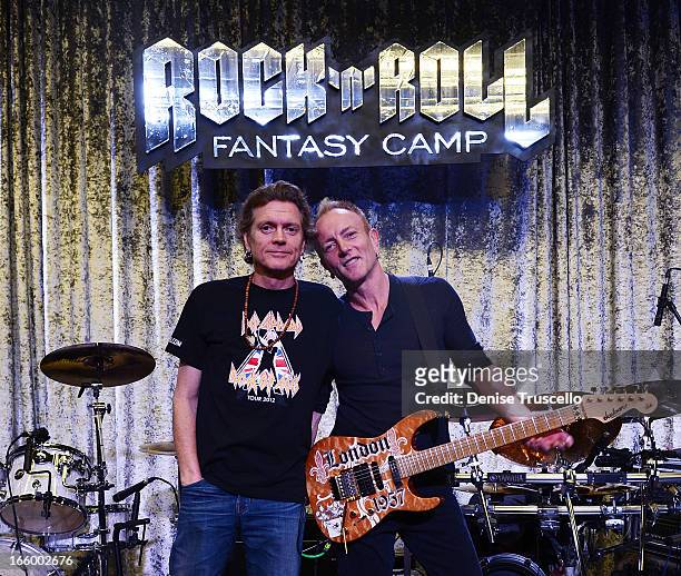 Rick Allen and Phil Collen of Def Leppard attend Rock 'n' Roll Fantasy Camp on April 7, 2013 in Las Vegas, Nevada.