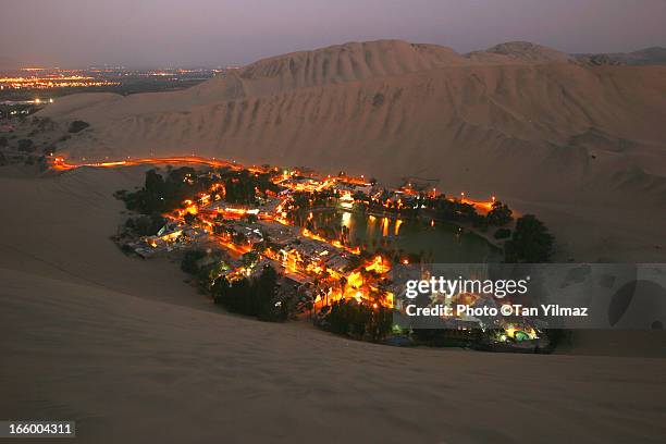 huacachina oasis at dusk - huacachina stock pictures, royalty-free photos & images