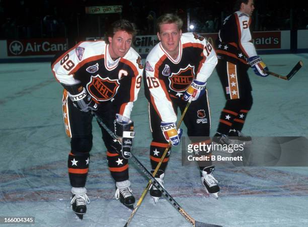 Brett Hull of the Campbell Conference and the St. Louis Blues and Wayne Gretzky of the Los Angeles Kings pose for a portrait before the 1993 44th NHL...