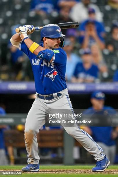Davis Schneider of the Toronto Blue Jays bats in the ninth inning against the Colorado Rockies at Coors Field on September 3, 2023 in Denver,...