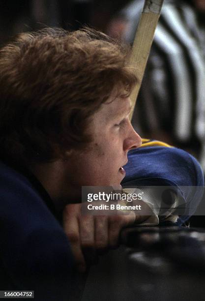 Jim Schoenfeld of the Buffalo Sabres looks on from the bench during an NHL game against the New York Rangers on December 20, 1978 at the Madison...