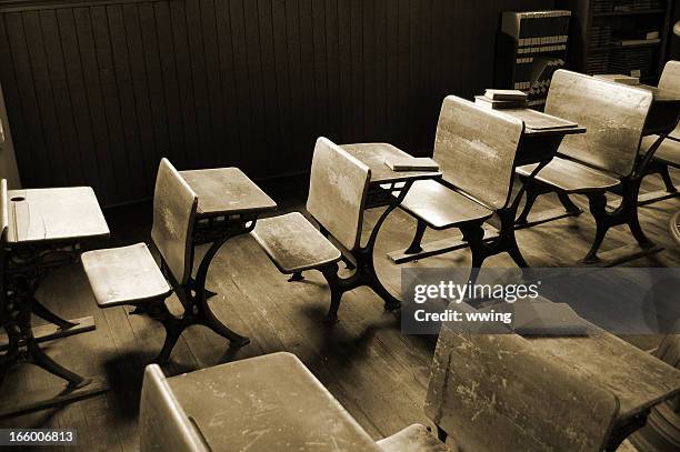 vintage classroom in sepia - oldest wooden schoolhouse stock pictures, royalty-free photos & images