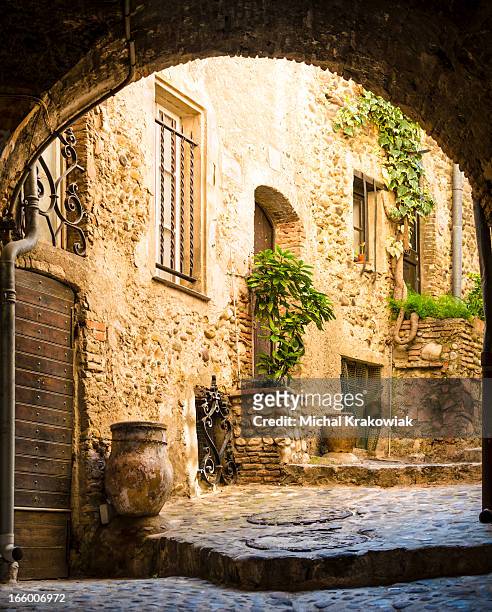 old courtyard - stone house stock pictures, royalty-free photos & images