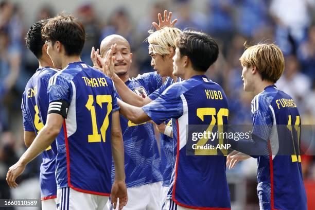 Wataru Endo of Japan, Ao Tanake of Japan, Diazen Maeda of Japan, Junya Ito of Japan, Takfusa Kubo of Japan, Kyogo Furuhashi of Japan celebrate the...